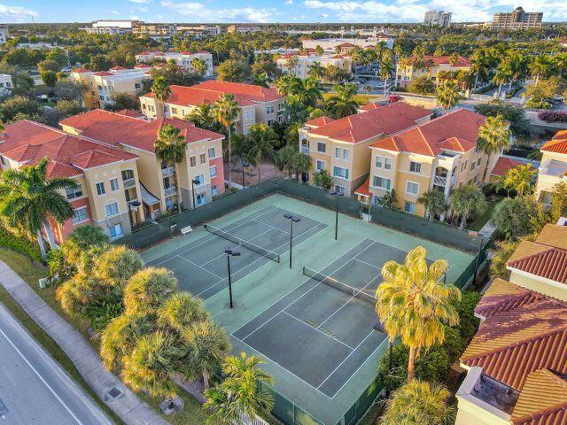 11024 Legacy Drive, Unit 104 Palm Beach Gardens, FL 33410 - Photo 18 of 26 an aerial view of a houses with a swimming pool