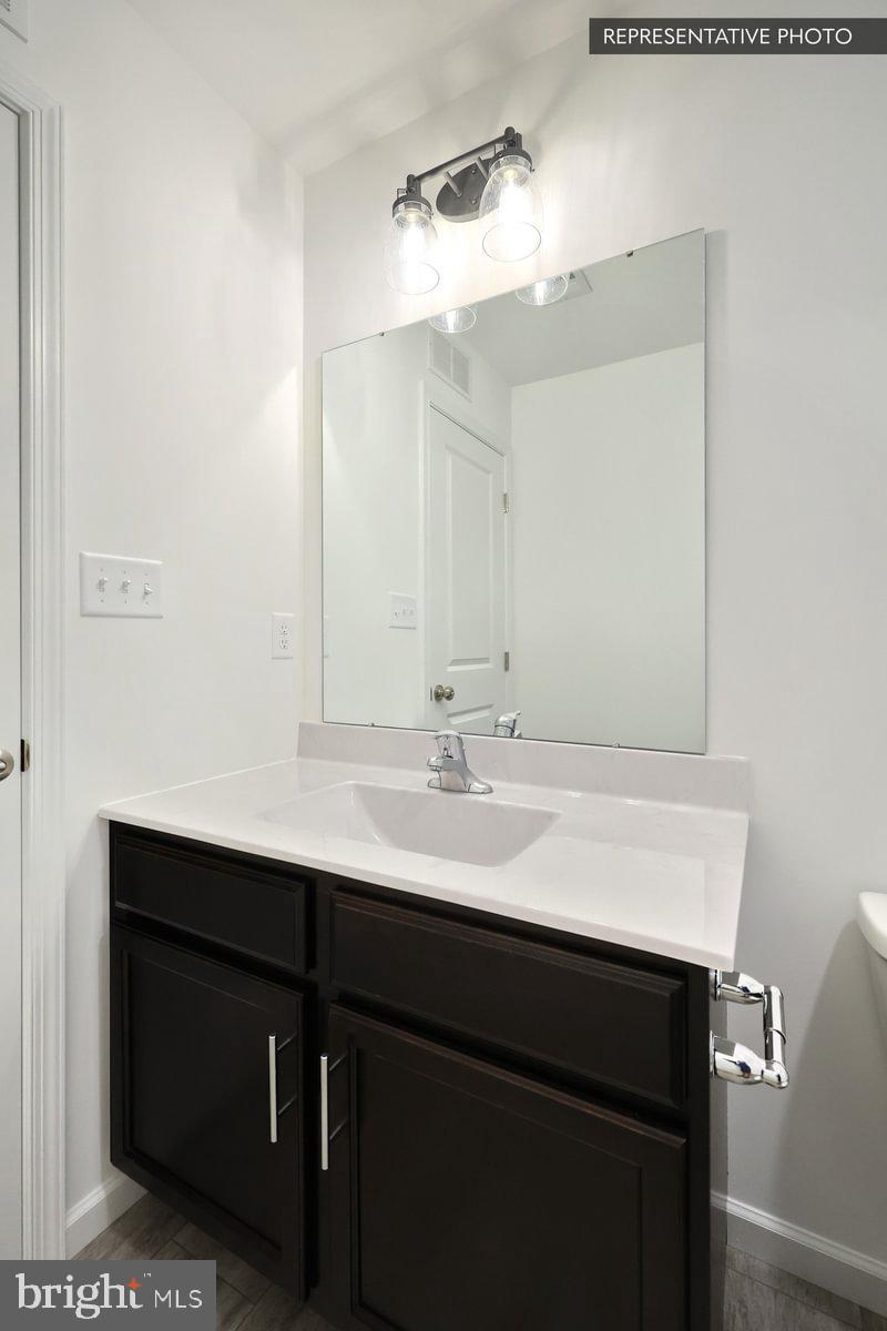 Sassafras Plan At Hills Spring Grove, PA 17362 - Photo 33 of 33 a bathroom with a sink and a mirror