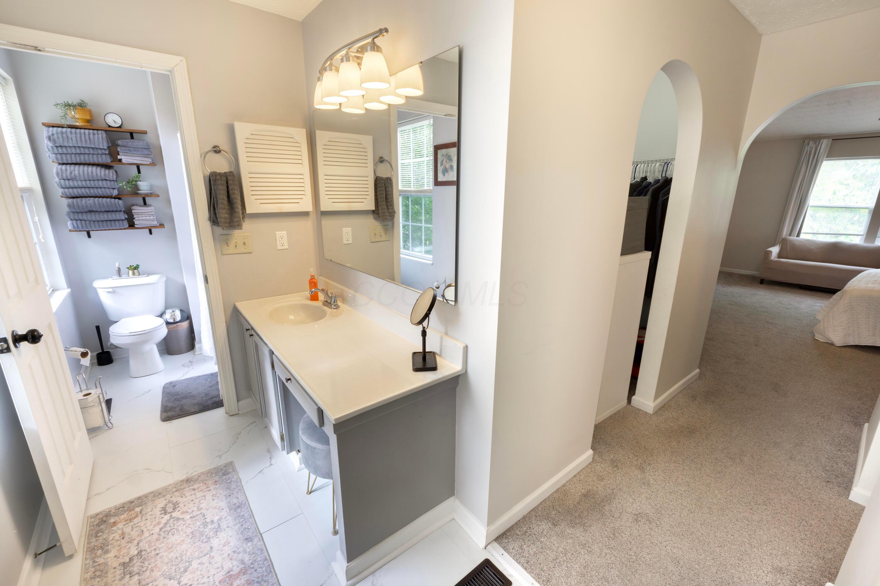160 Kettering Bend Delaware, OH 43015 - Photo 23 of 49 Primary bathroom has marble look flooring. Large vanity area and walk-in shower.