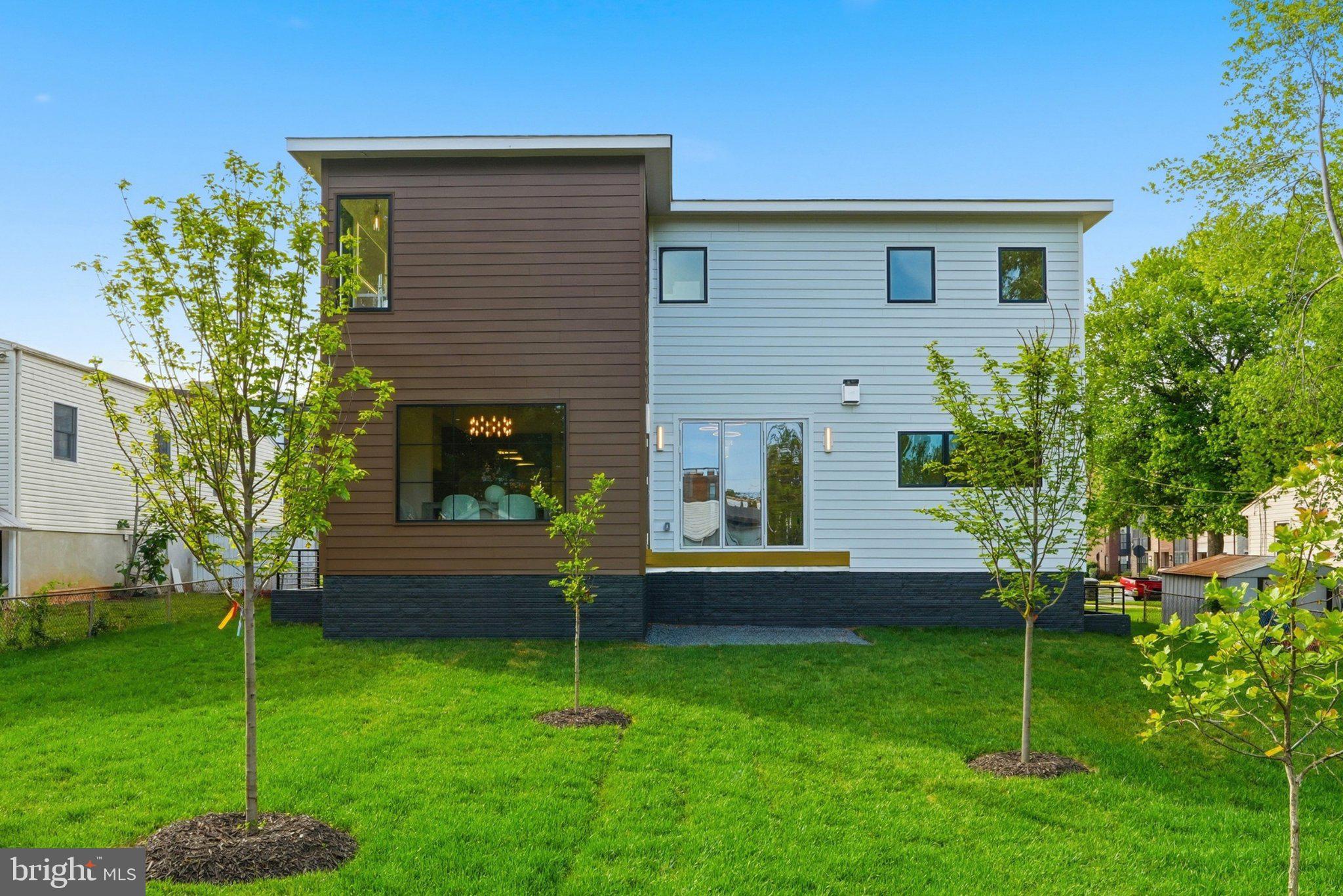 7421 Magarity Road Falls Church, VA 22043 - Photo 62 of 66 Modern home with lush green yard.