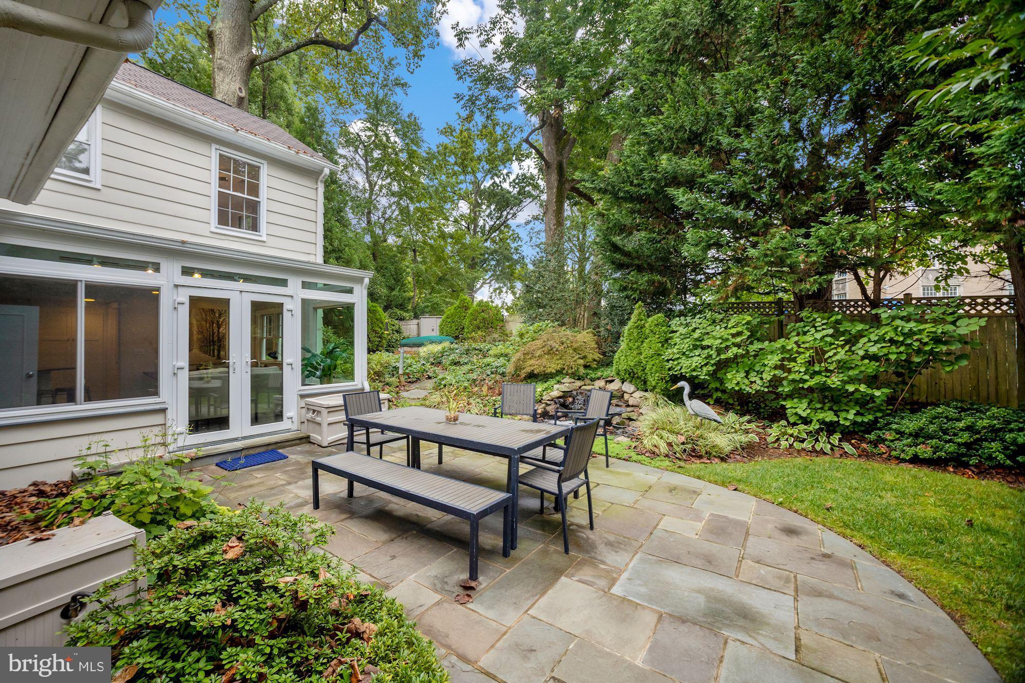 6820 Meadow Lane Chevy Chase, MD 20815 - Photo 41 of 54 Rear flagstone patio ideal for outdoor dining