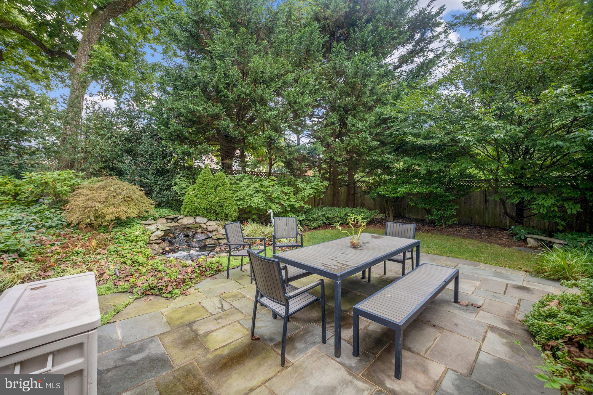 6820 Meadow Lane Chevy Chase, MD 20815 - Photo 42 of 54 Enjoy dining next to the outdoor water feature!
