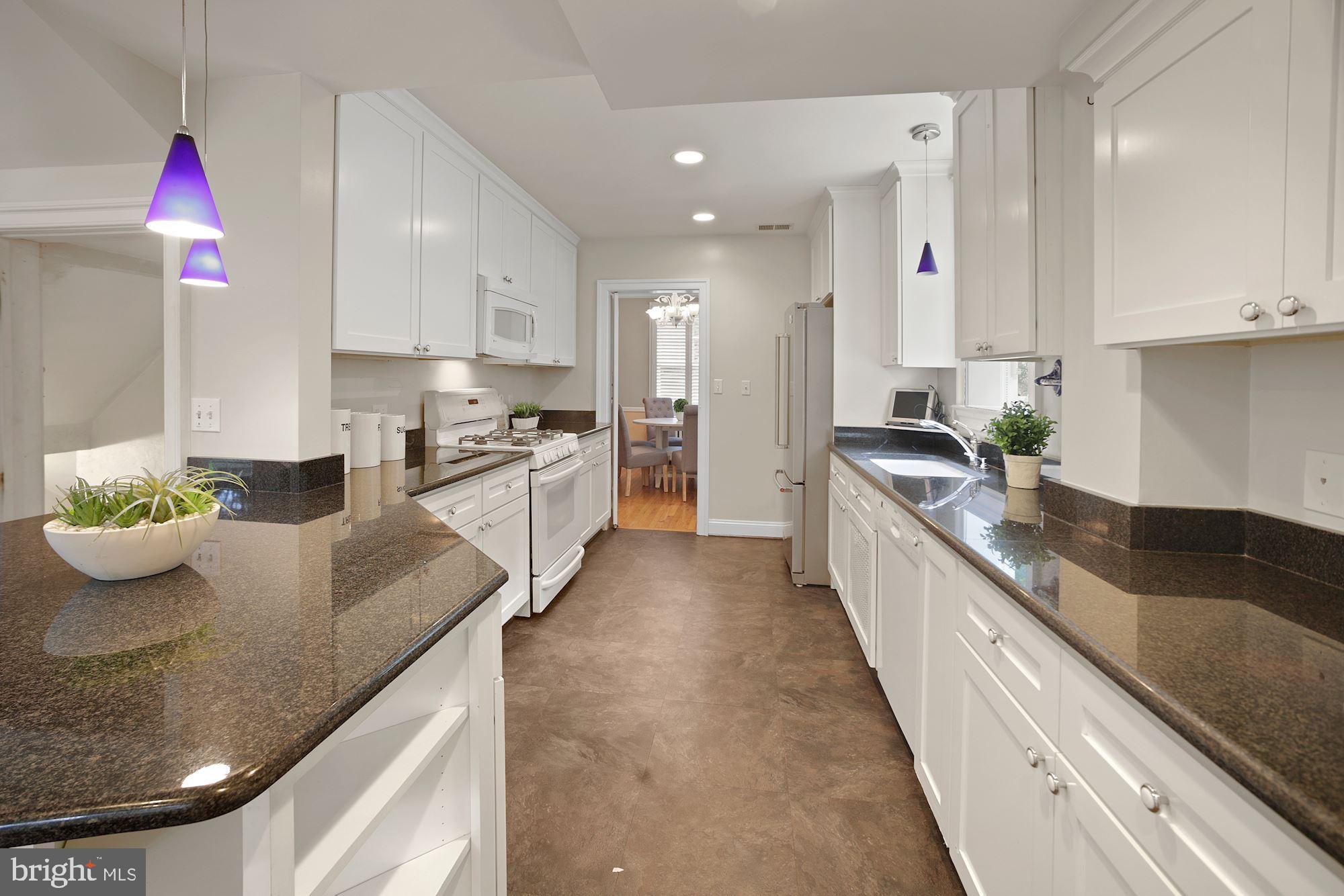 6820 Meadow Lane Chevy Chase, MD 20815 - Photo 10 of 54 Expansive counter and storage space