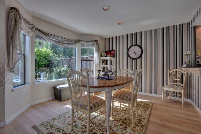 737 Superior Road Milpitas, CA 95035 - Photo 4 of 16 a view of a dining room with furniture window and wooden floor
