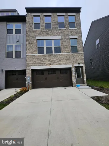 a front view of a house with yard