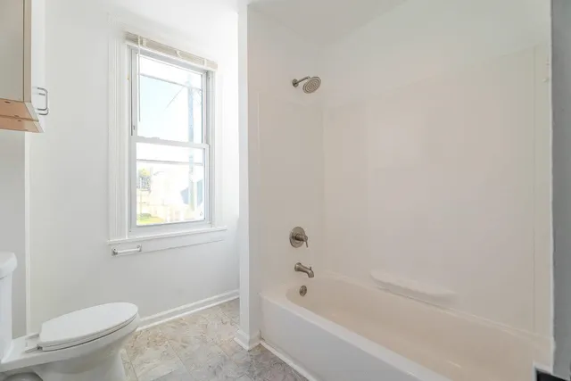 a bathroom with a sink and a bathtub