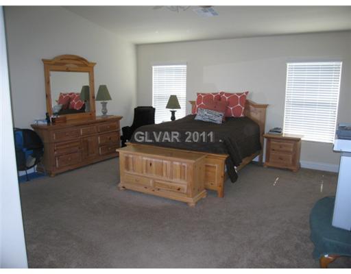 1357 Spice Ridge Court Henderson, NV 89012 - Photo 3 of 5 Master Bedroom. Large master with balcony for morning coffee!