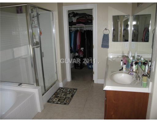 1357 Spice Ridge Court Henderson, NV 89012 - Photo 4 of 5 Master Bath/Spa. Seperate tub and shower with 2 sinks and 2 walk-in closets!