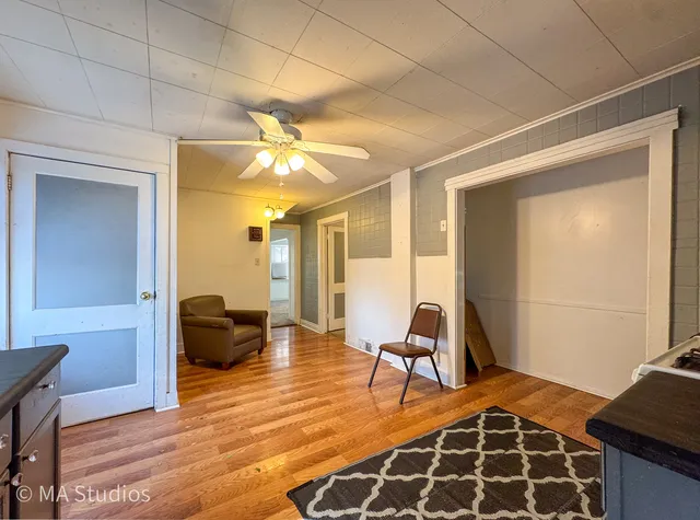 a bedroom with furniture and a window