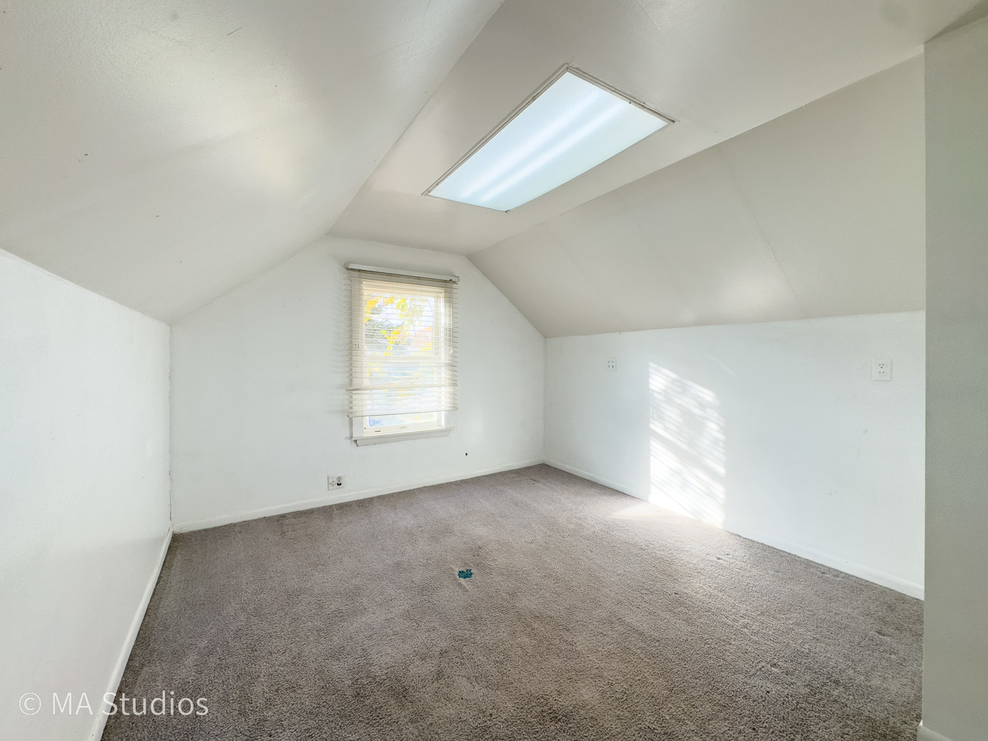 8-s057 South Vine Street Burr Ridge, IL 60527 - Photo 20 of 37 an empty room with windows