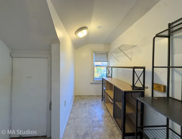 a view of hallway with stairs