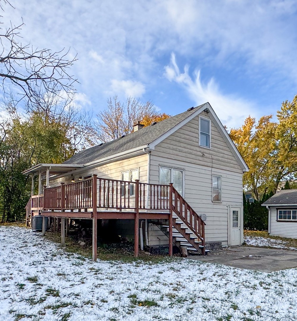 8-s057 South Vine Street Burr Ridge, IL 60527 - Photo 3 of 37 a view of a house with a yard