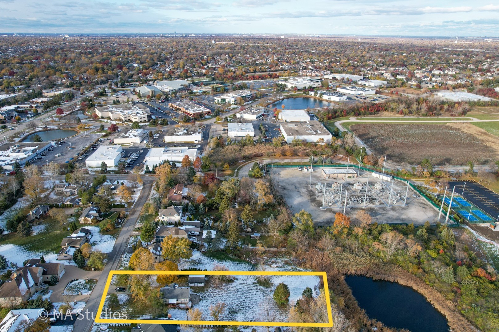 8-s057 South Vine Street Burr Ridge, IL 60527 - Photo 32 of 37 an aerial view of residential houses with outdoor space