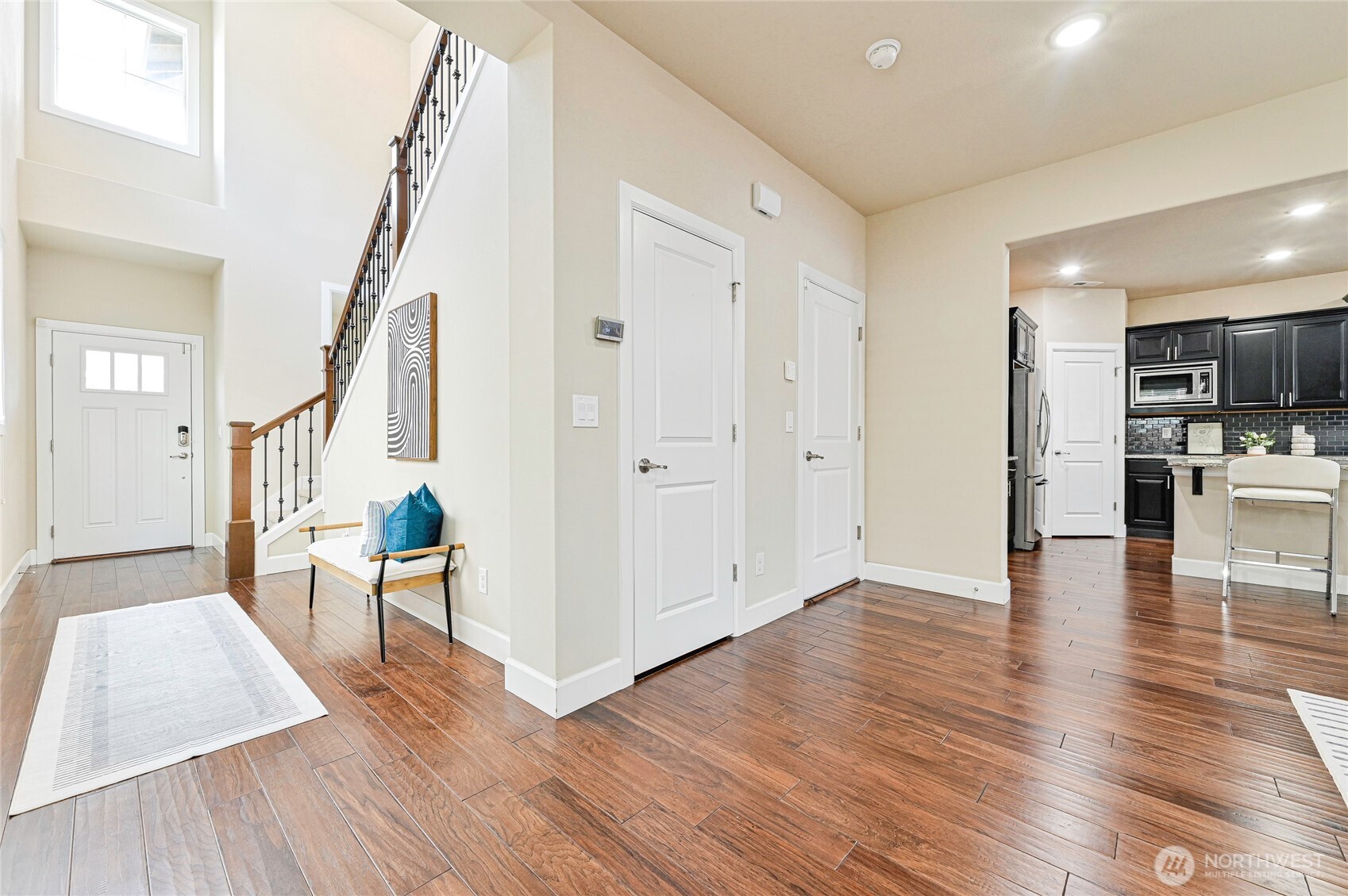 17312 40th Avenue Southeast Bothell, WA 98012 - Photo 4 of 34 a view of empty room with wooden floor and stairs