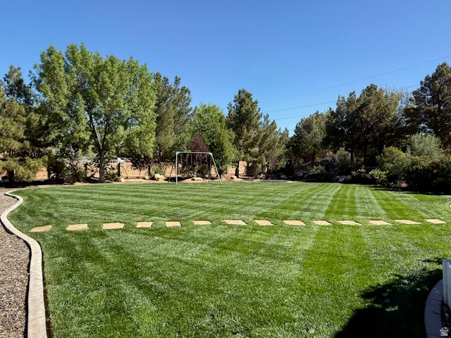 2917 Old Farm Road Washington, UT 84780 - Photo 98 of 105 View of green lawn featuring view of scattered trees