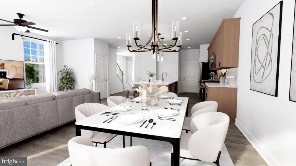 523 Linfield Road, Unit WESTERLY Royersford, PA 19468 - Photo 5 of 10 a view of a a dining room with furniture window and wooden floor