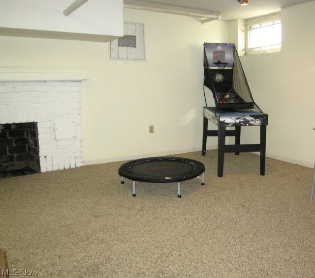 2939 Huntington Road Cleveland, OH 44120 - Photo 18 of 21 Lower level with fireplace partially finished in 2014.