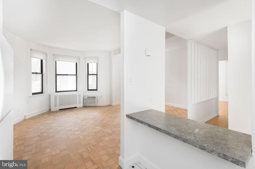 1218 Walnut Street, Unit 305 Philadelphia, PA 19107 - Photo 12 of 17 a view of an empty room with a window
