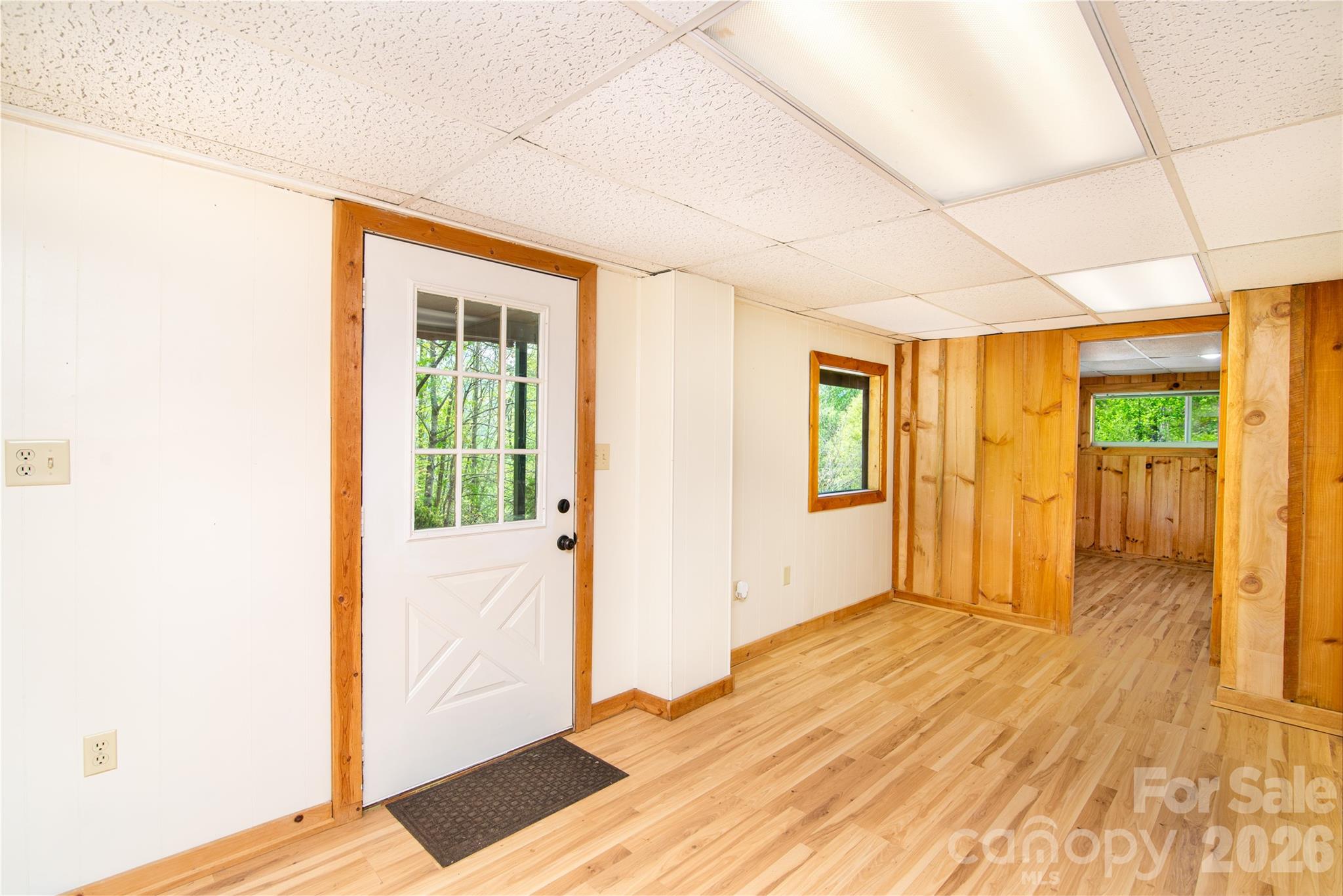 298 Timbuktu Road Sylva, NC 28779 - Photo 11 of 24 a view of an empty room with glass door