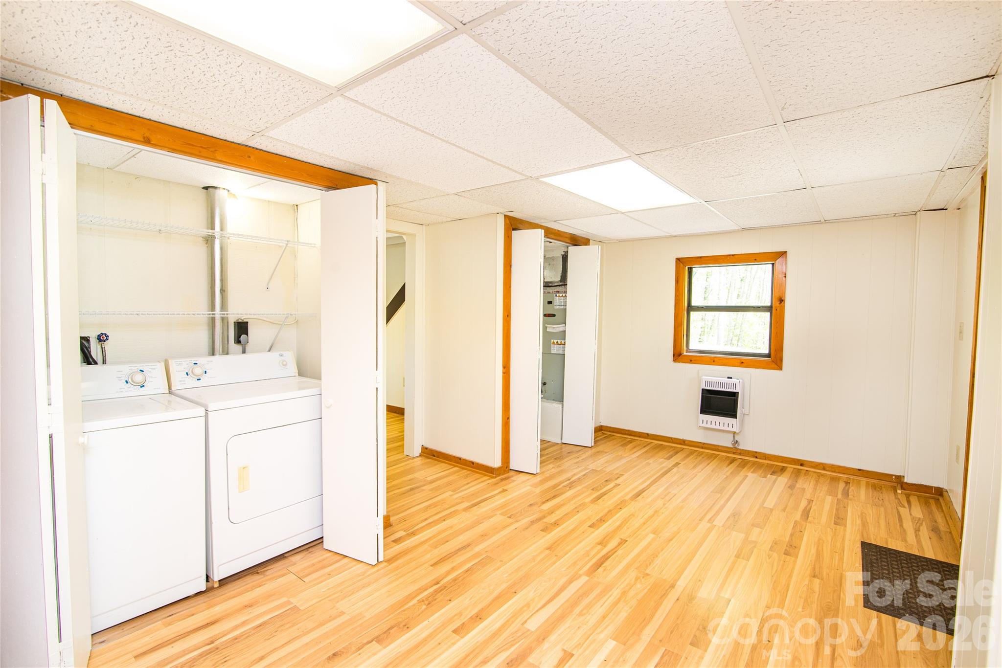 298 Timbuktu Road Sylva, NC 28779 - Photo 12 of 24 a bathroom with a sink a mirror and a window