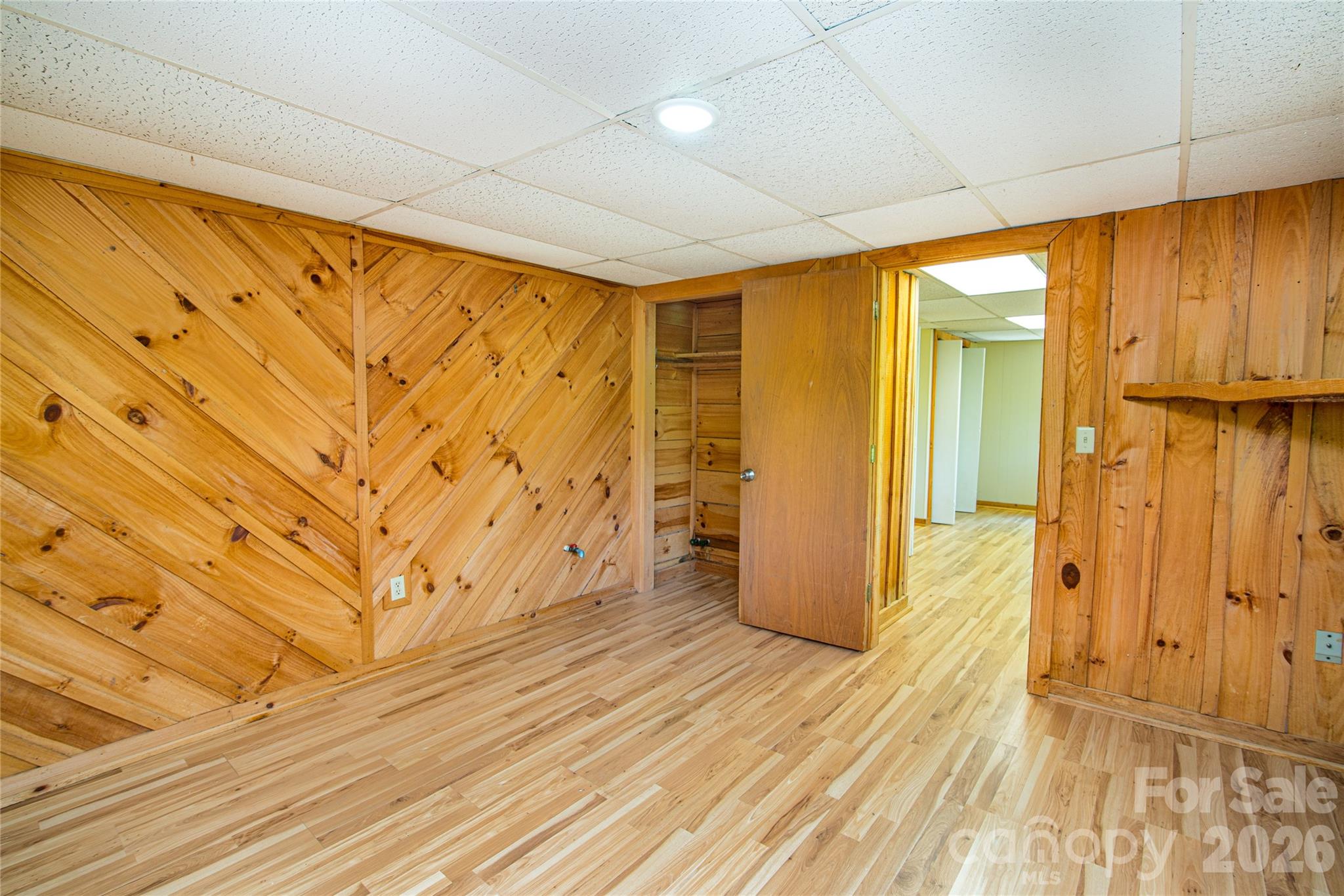 298 Timbuktu Road Sylva, NC 28779 - Photo 14 of 24 a view of a room with wooden floor and door