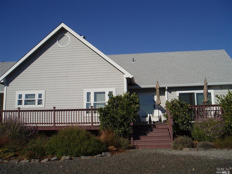 1613 Spring Hill Road Petaluma, CA 94952 - Photo 1 of 1 Deck provides views of vineyard and the mountains. The home has 2 vineyards - 1 in the front and 1 at the rear of the property.