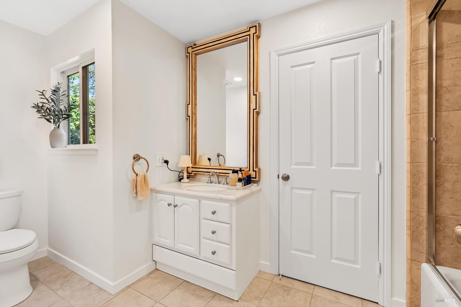110 Viola Way Angwin, CA 94508 - Photo 16 of 31 a bathroom with a granite countertop sink a toilet and a mirror