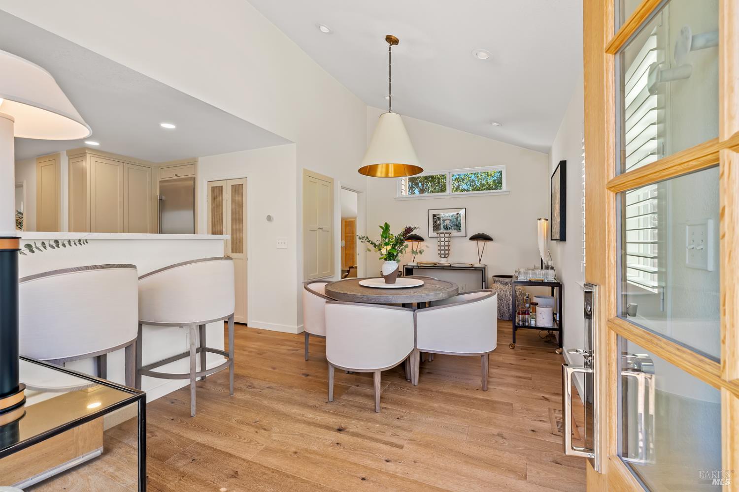110 Viola Way Angwin, CA 94508 - Photo 6 of 31 a dining room with furniture a chandelier and wooden floor