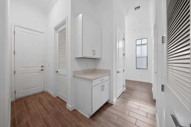 a very nice looking living room with a couch and a flat screen tv