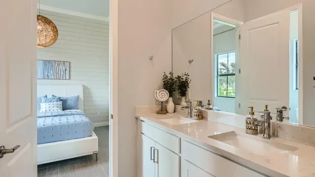 a bathroom with double vanity sink