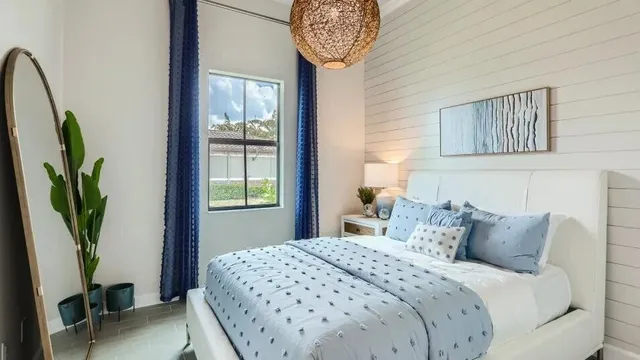 a kitchen with a sink and a large window