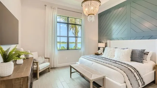 a bathroom with double vanity sink a mirror and a toilet