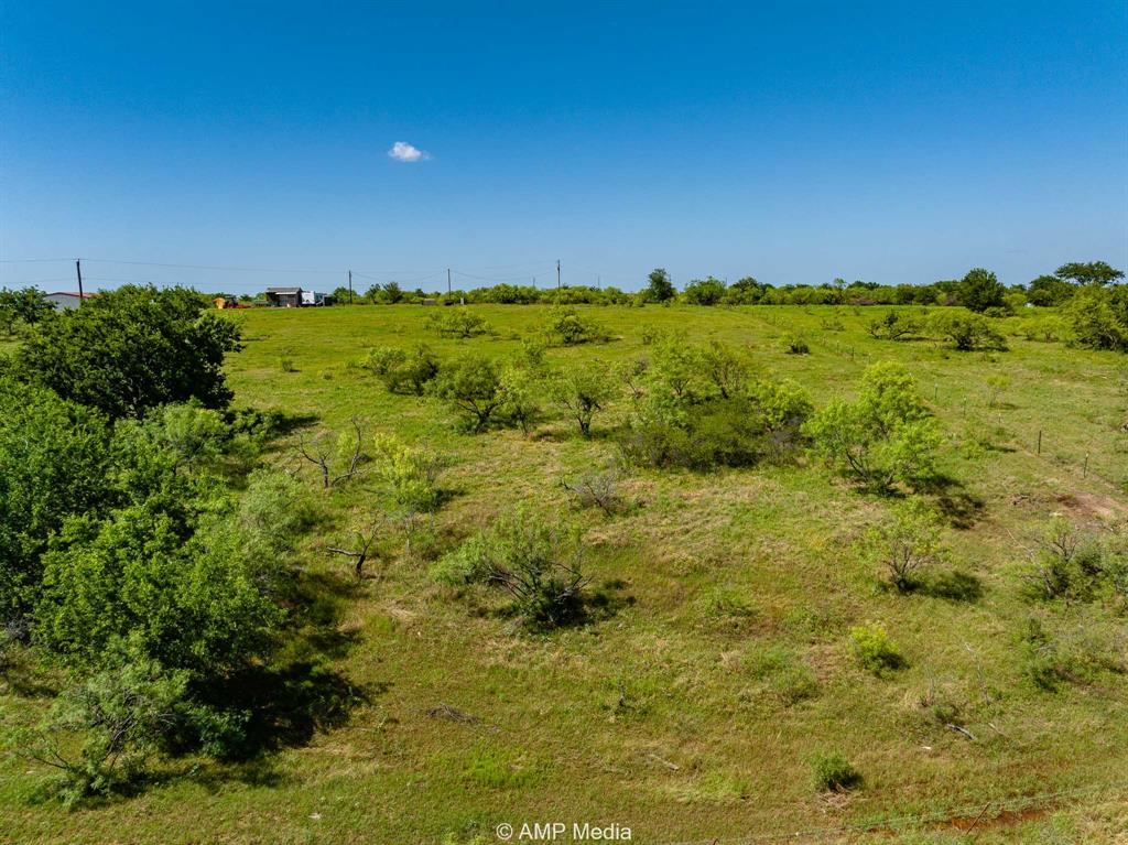 3641 A Carpenter Road Nocona, TX 76255 - Photo 25 of 27 a view of a large yard with lots of green space