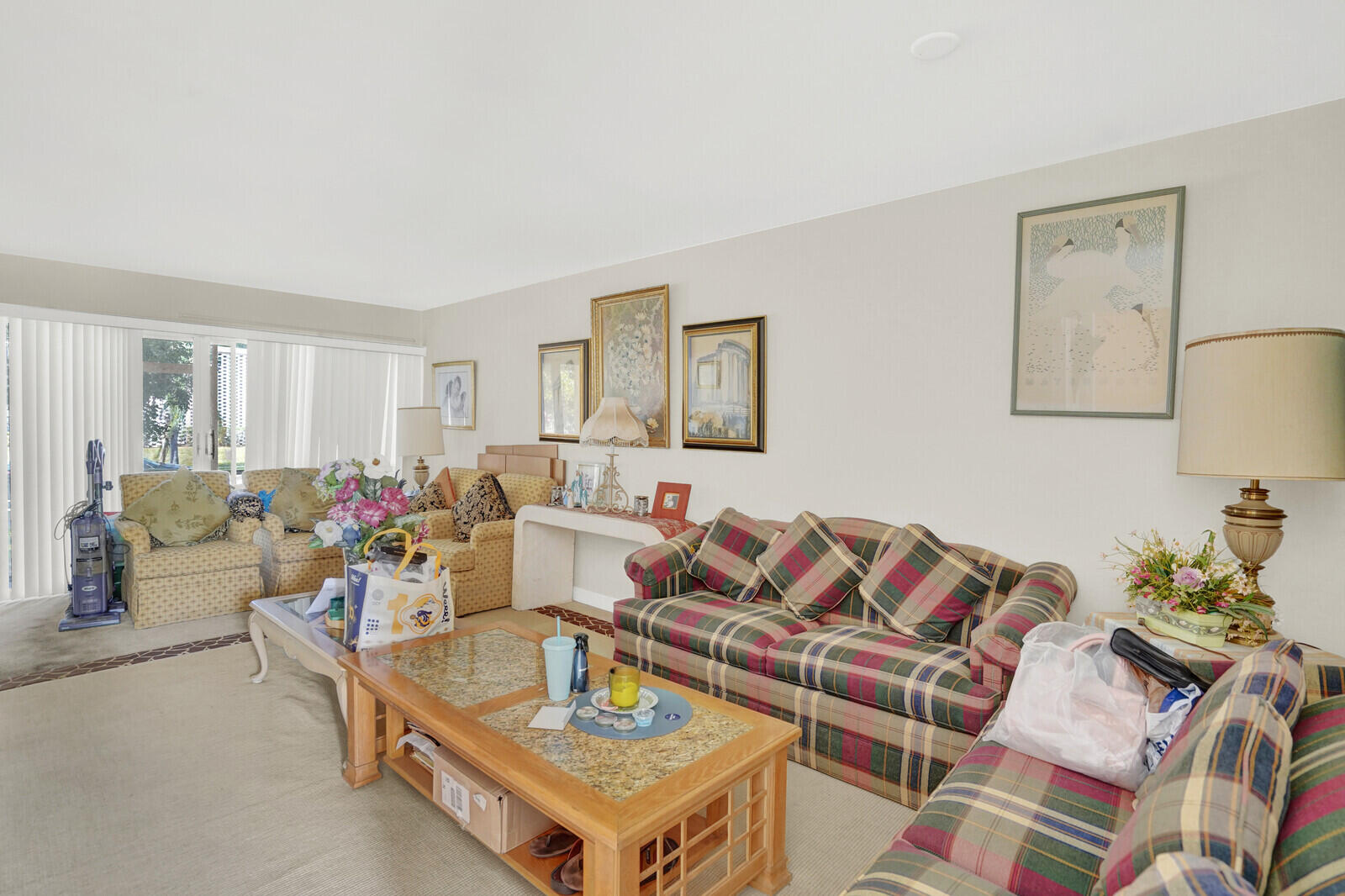 1505 Crescent Circle, Unit A11 Lake Park, FL 33403 - Photo 5 of 14 a living room with furniture and a couch