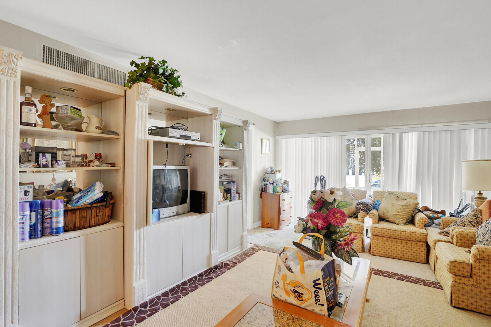 1505 Crescent Circle, Unit A11 Lake Park, FL 33403 - Photo 7 of 14 a living room with furniture and a flat screen tv