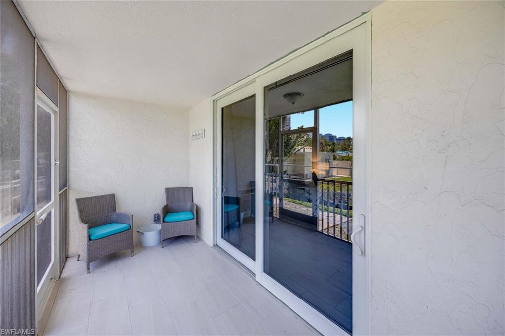 5 Bluebill Avenue, Unit 108 Naples, FL 34108 - Photo 18 of 49 View of balcony