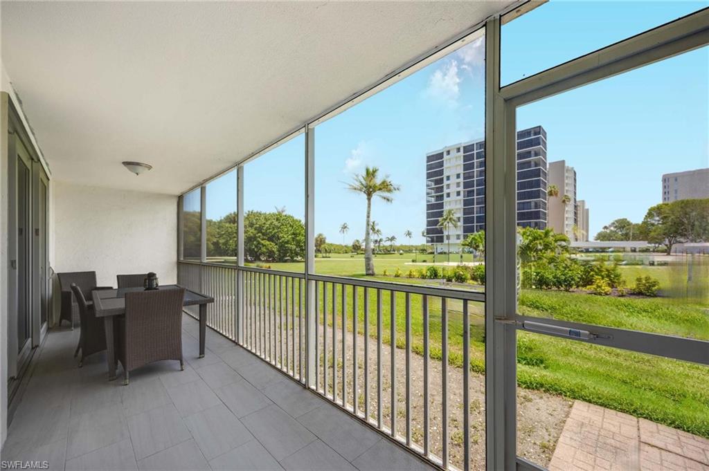 5 Bluebill Avenue, Unit 108 Naples, FL 34108 - Photo 19 of 49 View of sunroom / solarium