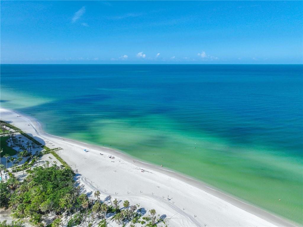 5 Bluebill Avenue, Unit 108 Naples, FL 34108 - Photo 28 of 49 Water view featuring local beach