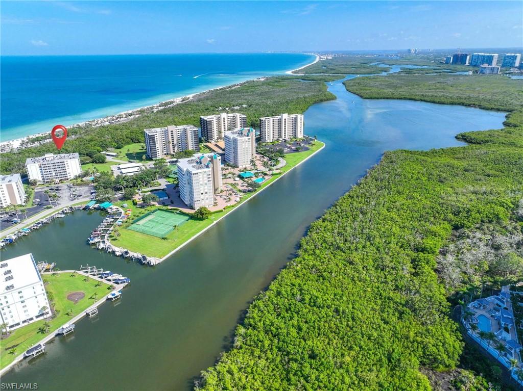 5 Bluebill Avenue, Unit 108 Naples, FL 34108 - Photo 29 of 49 View of urban area featuring a nearby body of water