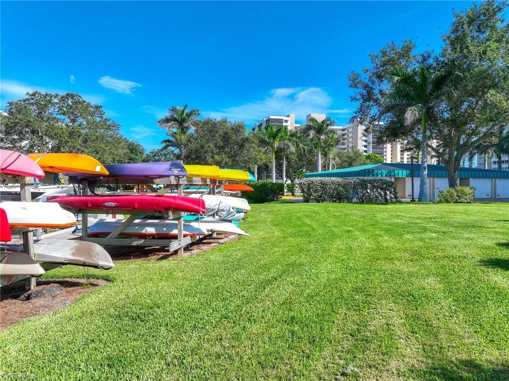 5 Bluebill Avenue, Unit 108 Naples, FL 34108 - Photo 35 of 49 View of green lawn
