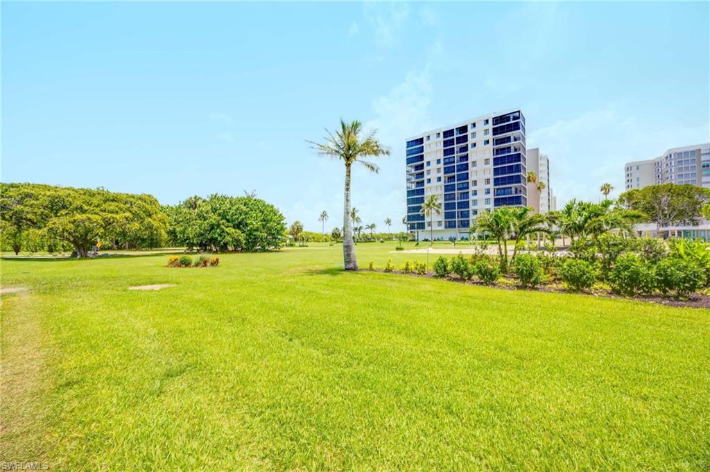 5 Bluebill Avenue, Unit 108 Naples, FL 34108 - Photo 36 of 49 View of green lawn