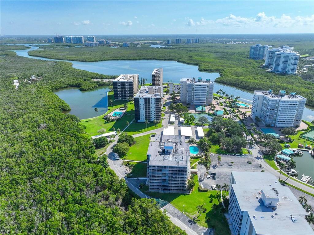 5 Bluebill Avenue, Unit 108 Naples, FL 34108 - Photo 44 of 49 View of urban area with a large body of water