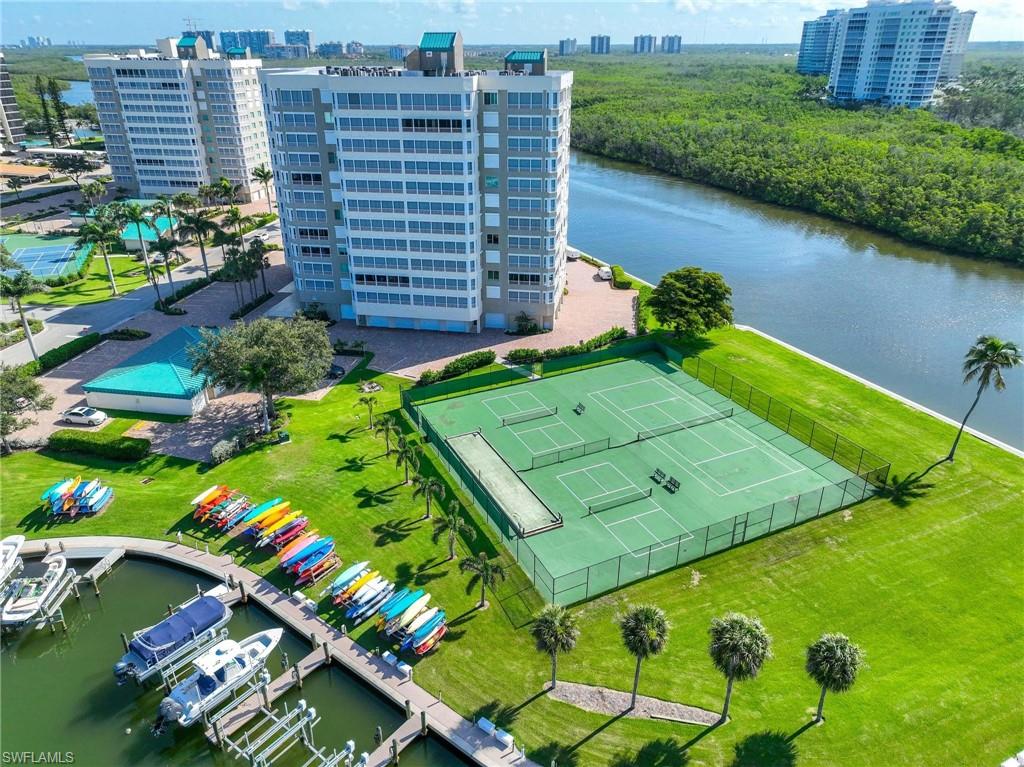 5 Bluebill Avenue, Unit 108 Naples, FL 34108 - Photo 48 of 49 View of urban area with a nearby body of water