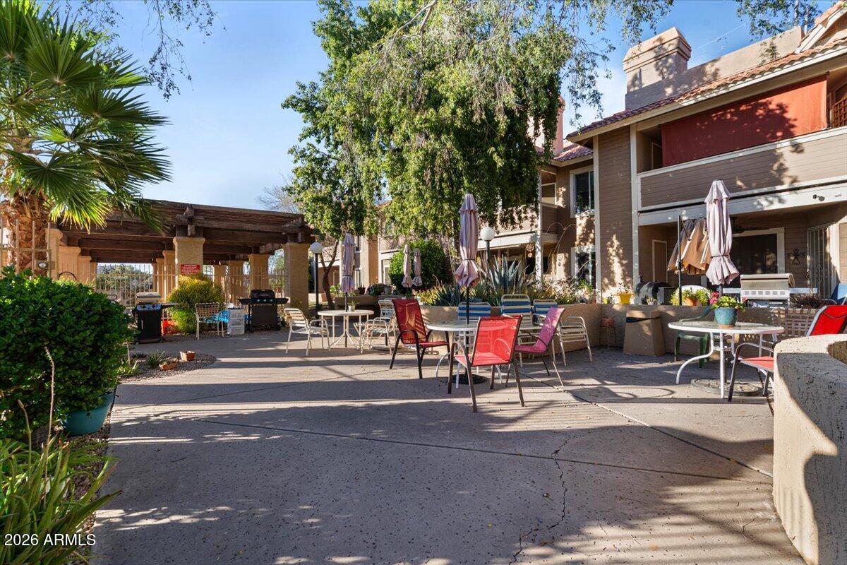5230 East Brown Road, Unit 110 Mesa, AZ 85205 - Photo 42 of 48 Patio near community pool