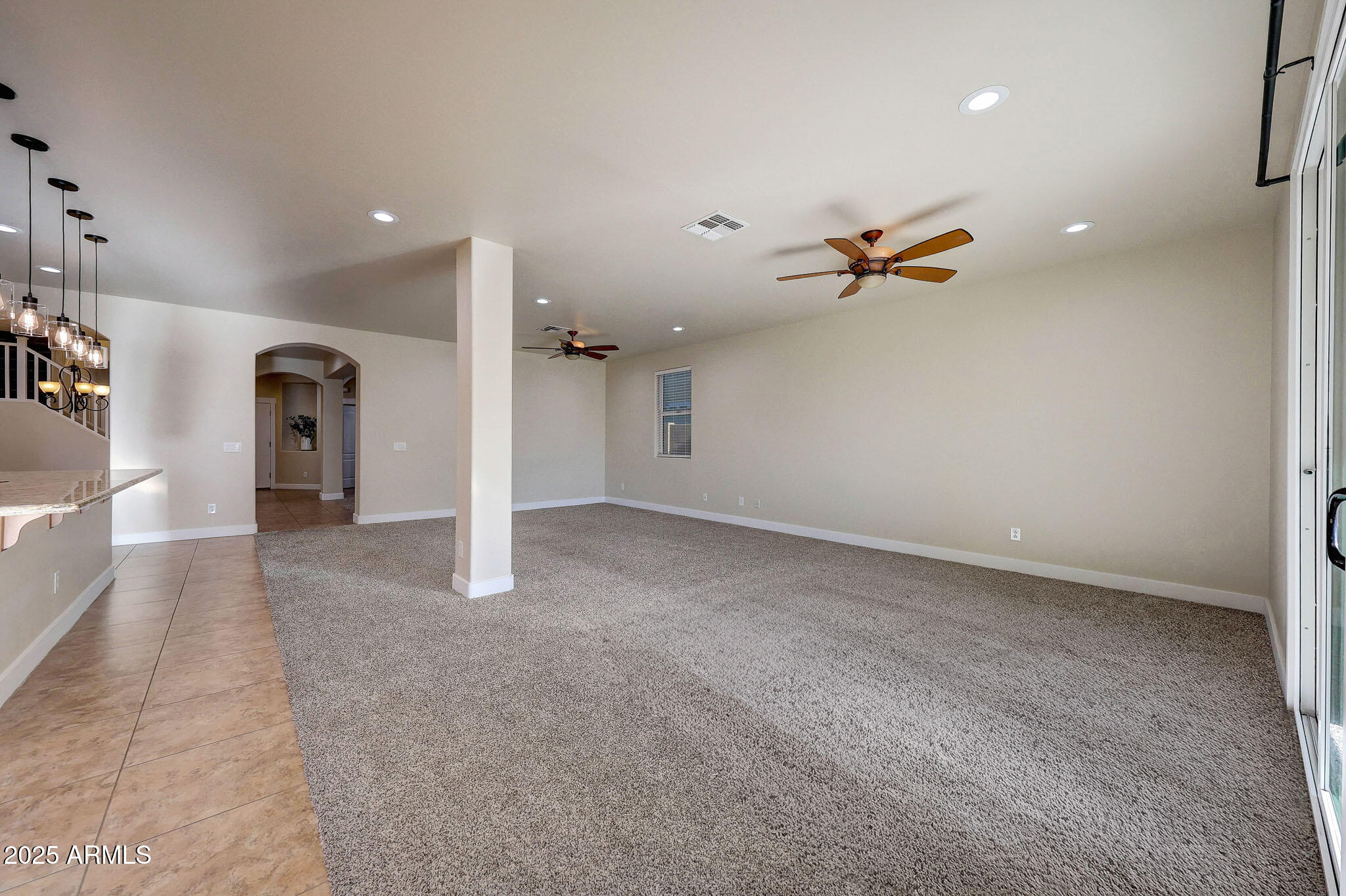 20719 West Hamilton Street Buckeye, AZ 85396 - Photo 24 of 100 a view of a livingroom with a staircase