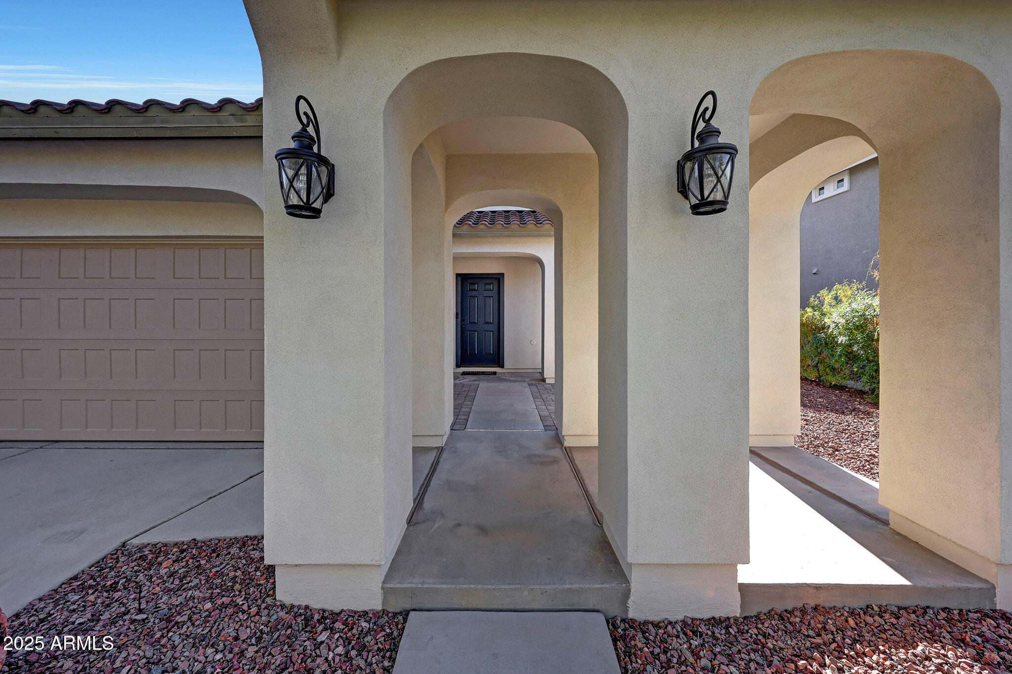 20719 West Hamilton Street Buckeye, AZ 85396 - Photo 4 of 100 a view of a door and the door of the house