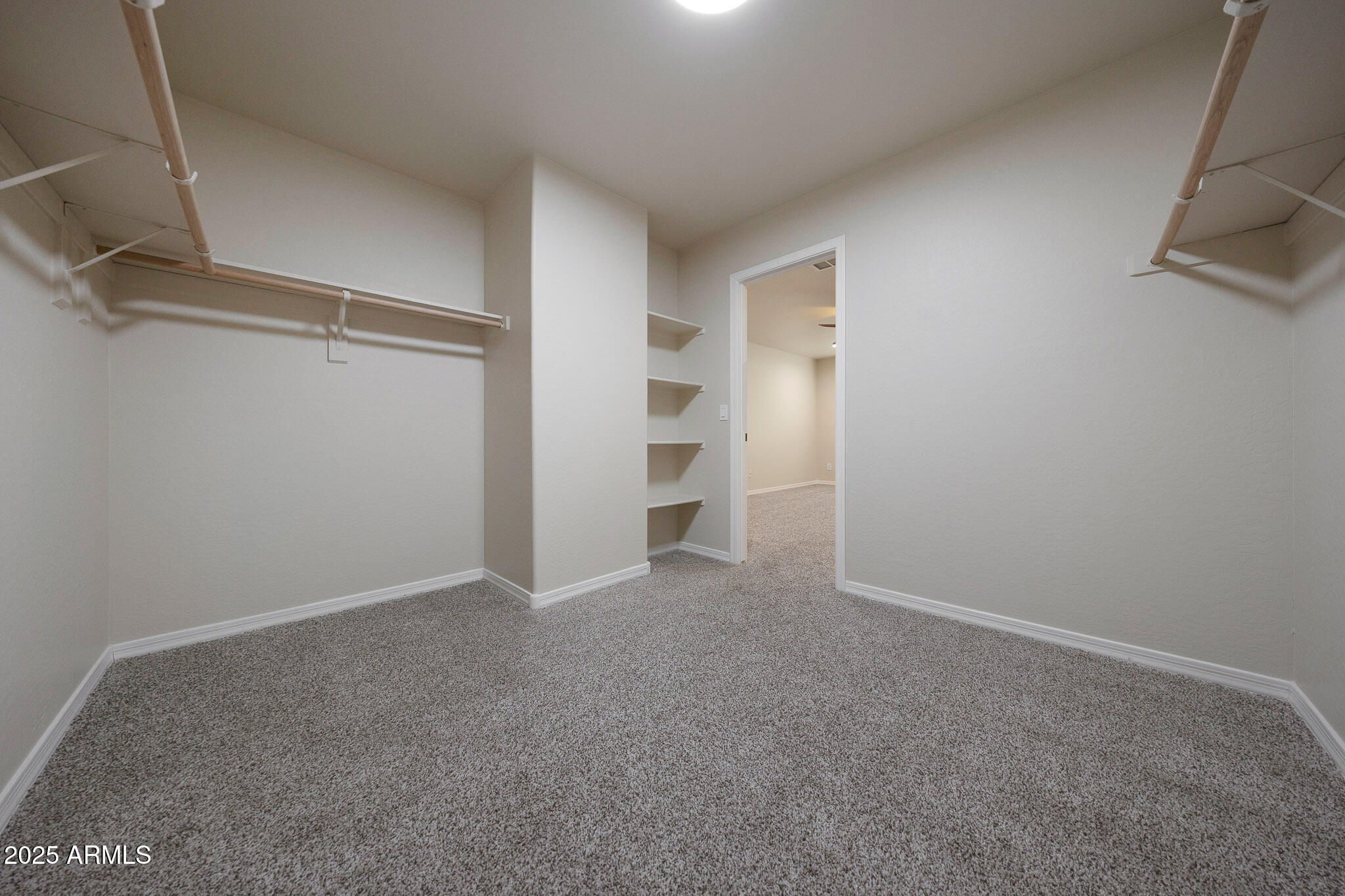 20719 West Hamilton Street Buckeye, AZ 85396 - Photo 47 of 100 a view of an empty room with a window