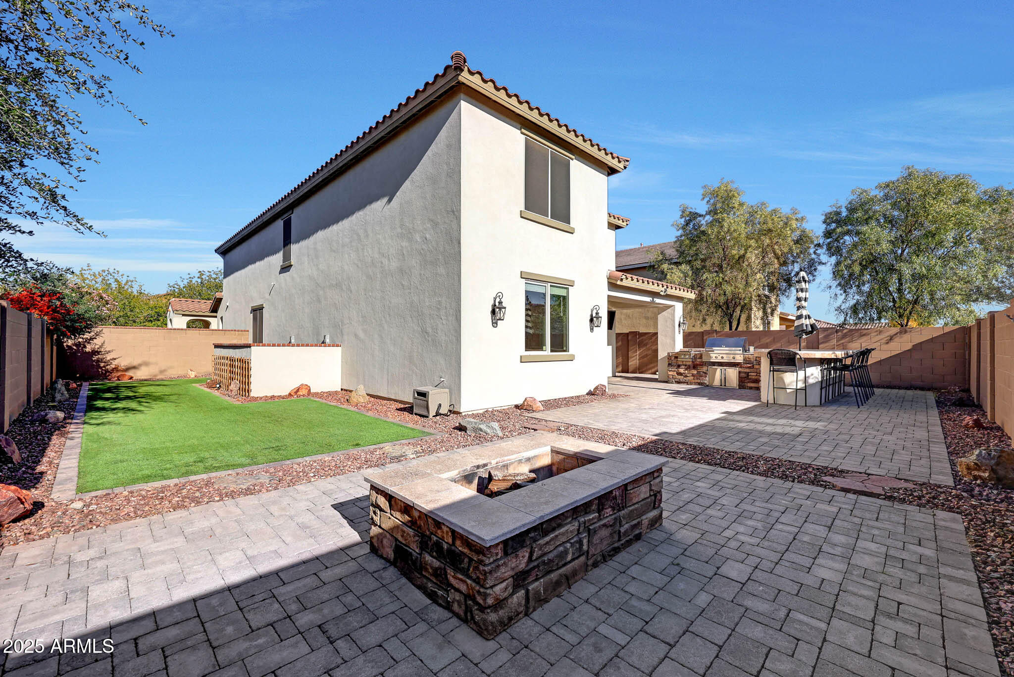 20719 West Hamilton Street Buckeye, AZ 85396 - Photo 52 of 100 a front view of a house with garden
