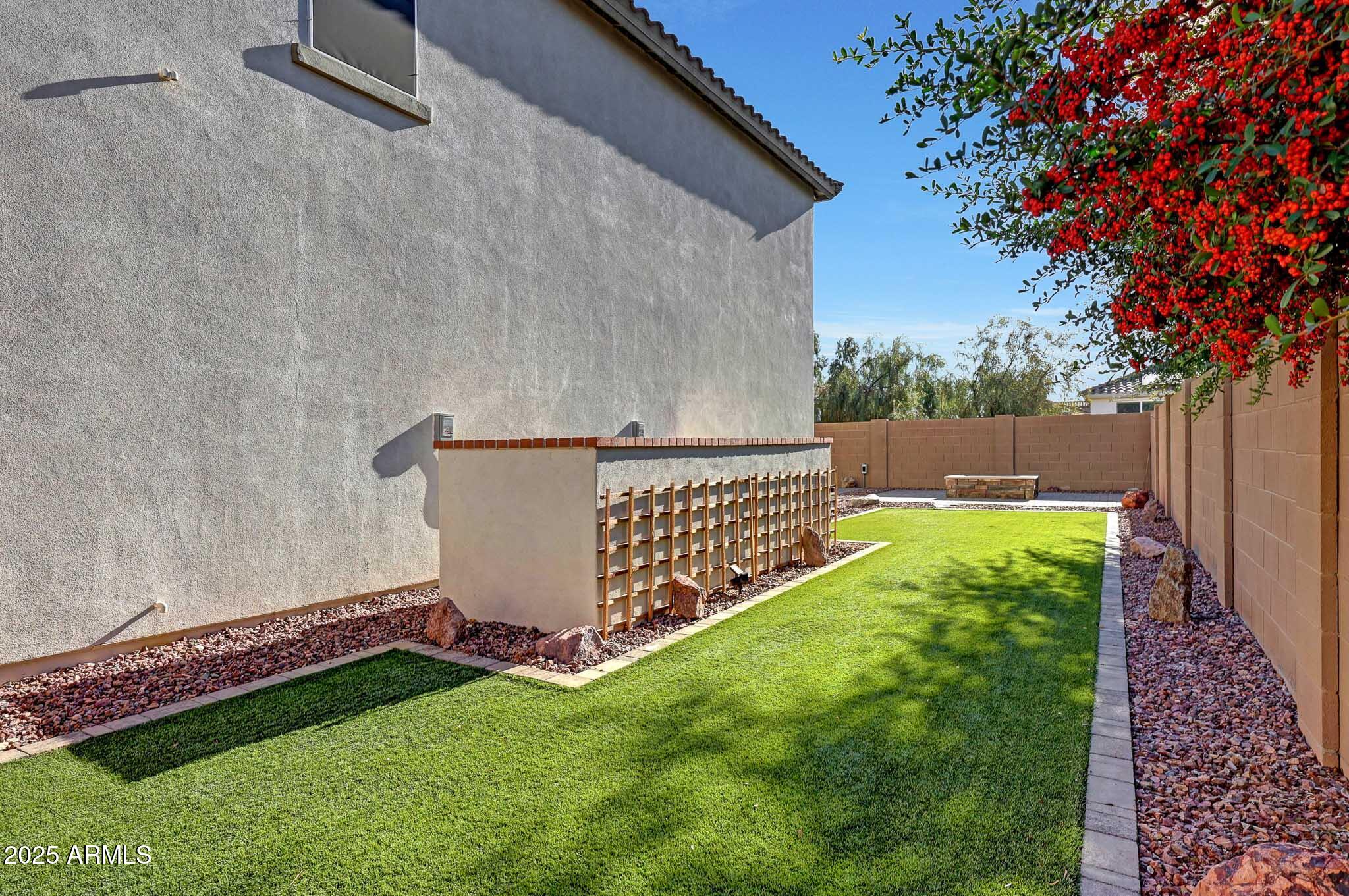 20719 West Hamilton Street Buckeye, AZ 85396 - Photo 55 of 100 a view of a backyard with a garden