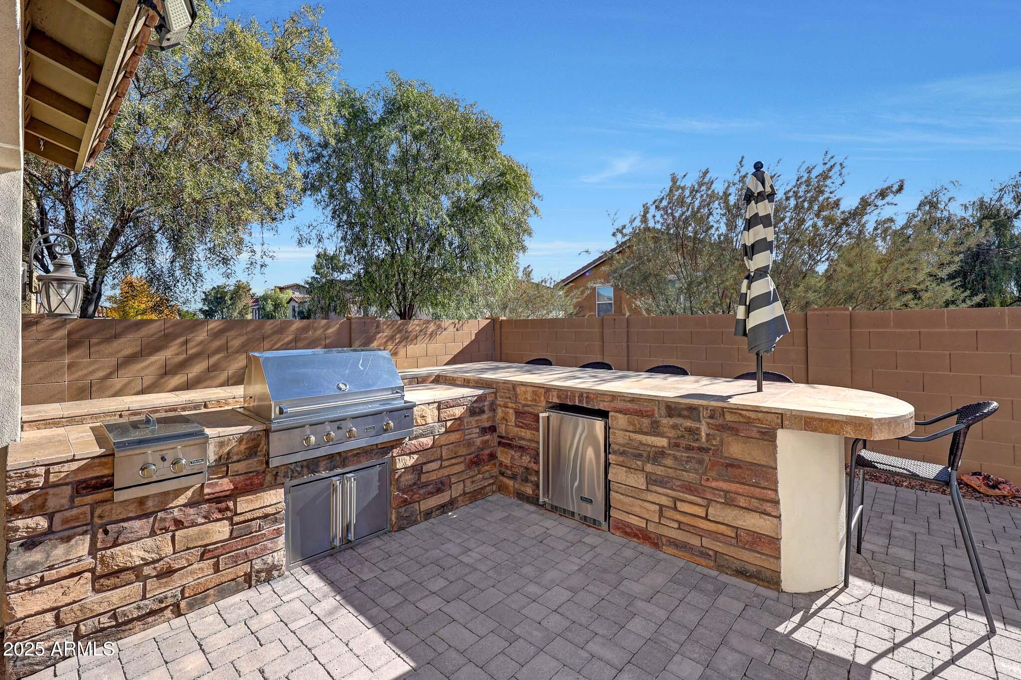 20719 West Hamilton Street Buckeye, AZ 85396 - Photo 57 of 100 a view of a chairs and table on the terrace